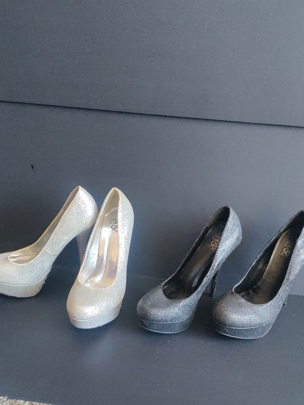 Speed Limit 98 Glitter Platform Pumps in Silver and Black